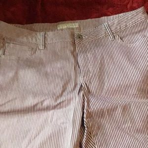 Striped lavender in color. 16w and are capri pants. Smoke free home.